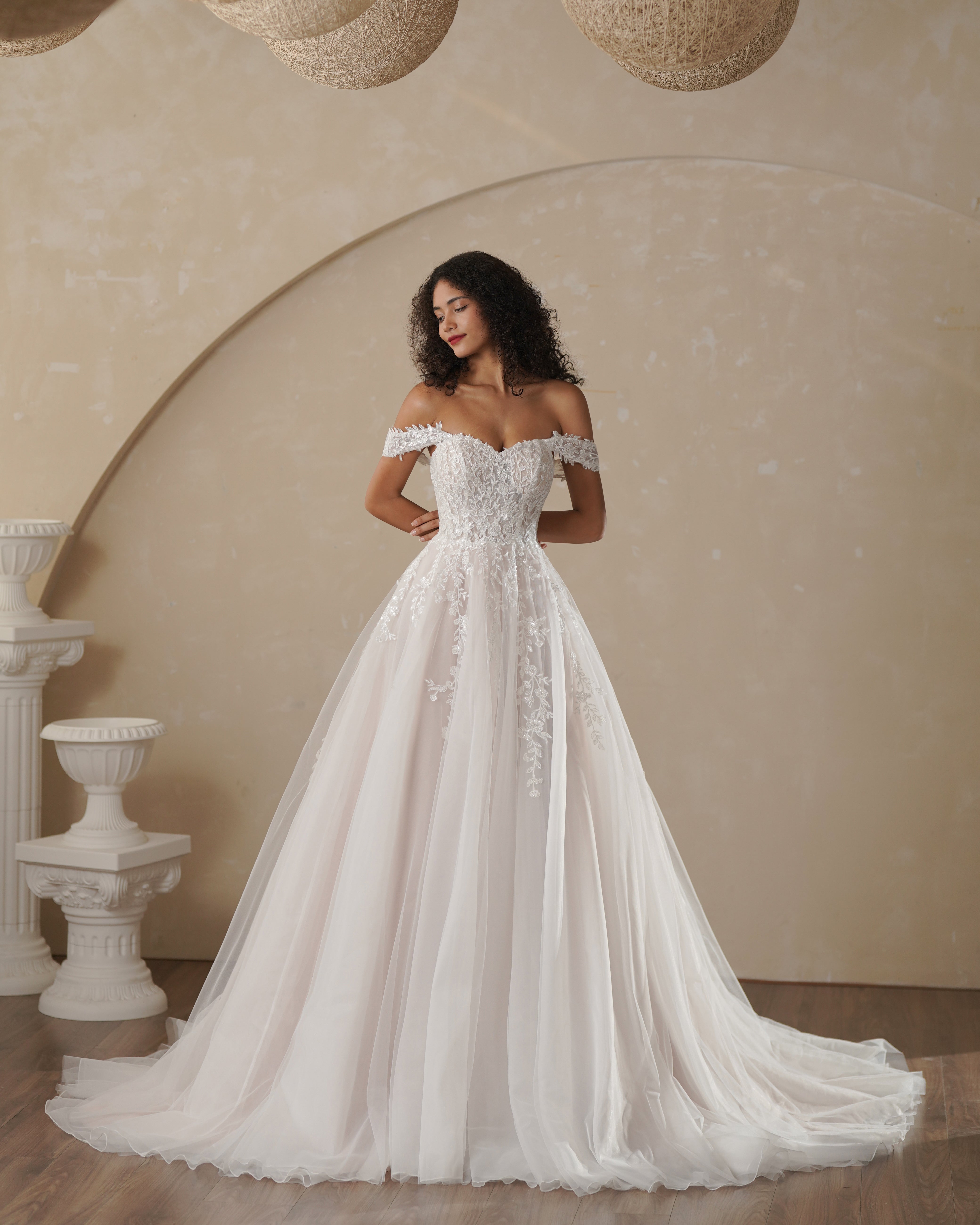 Boho wedding dress for bridal with off shoulder design and applique lace
