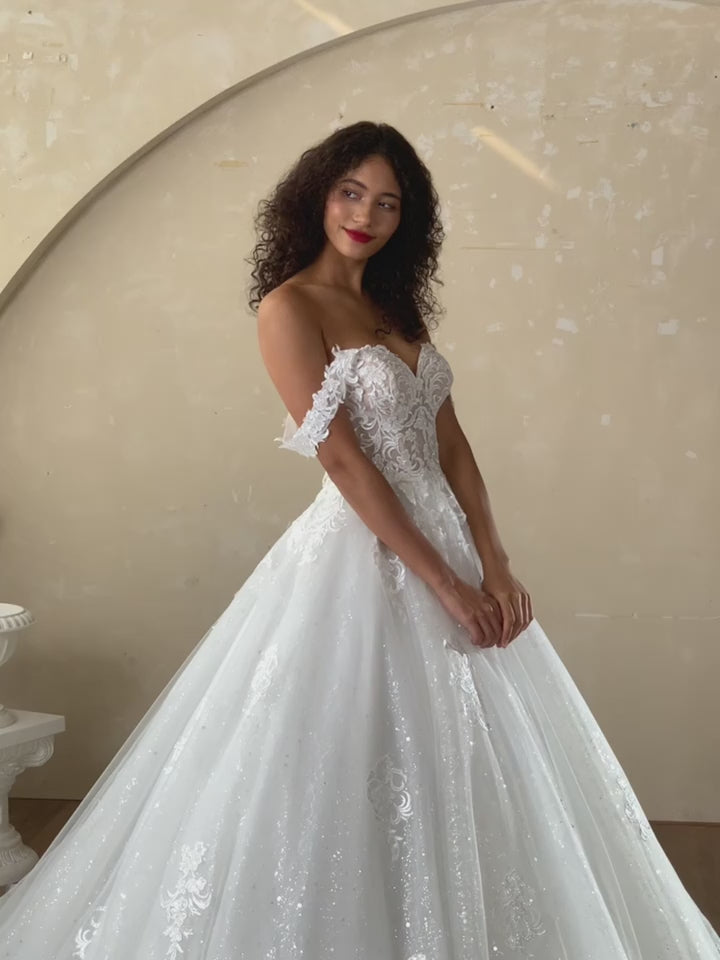 Boho wedding dress for bridal with off shoulder design and applique lace